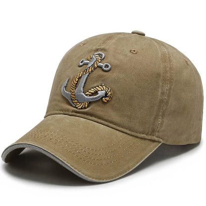 Stylish unisex washed baseball cap featuring a finely embroidered anchor emblem, adjustable for comfort.