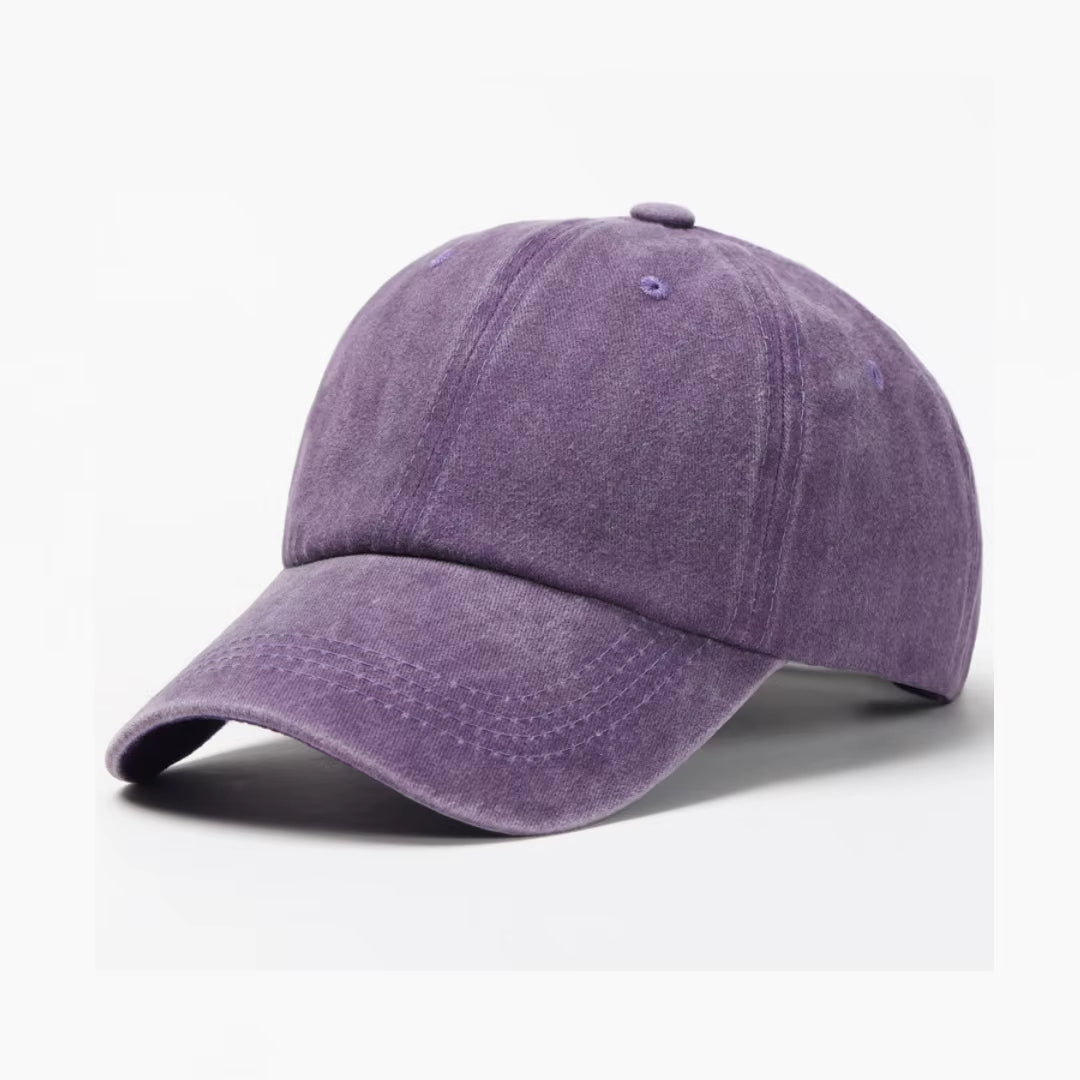 Stylish unisex washed cotton baseball cap, adjustable and comfortable. Perfect for a vintage-inspired look.