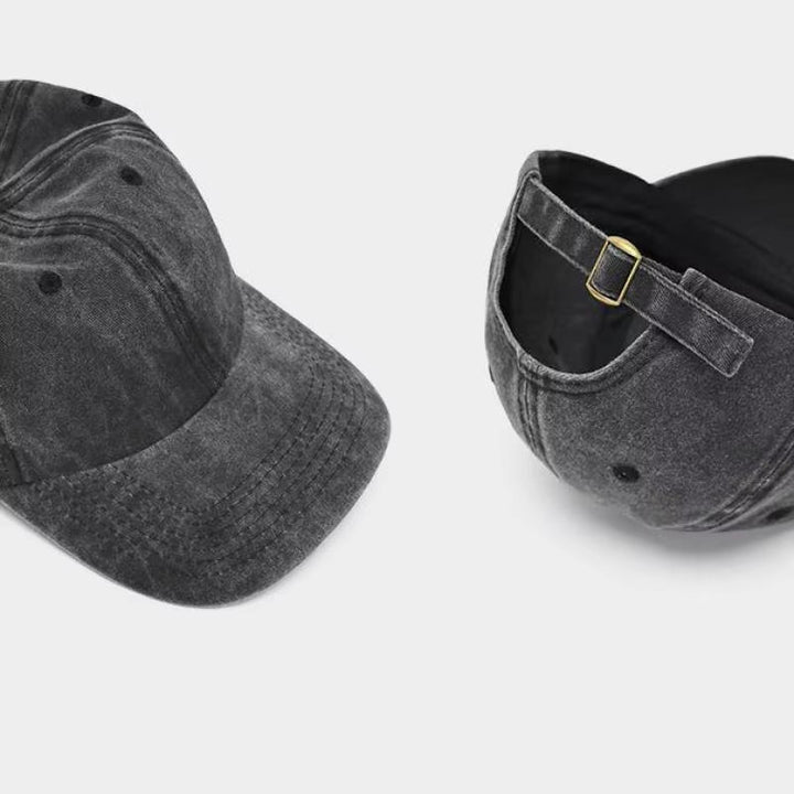 Adjustable unisex washed cotton baseball cap, featuring a comfortable low-profile design and vintage style.