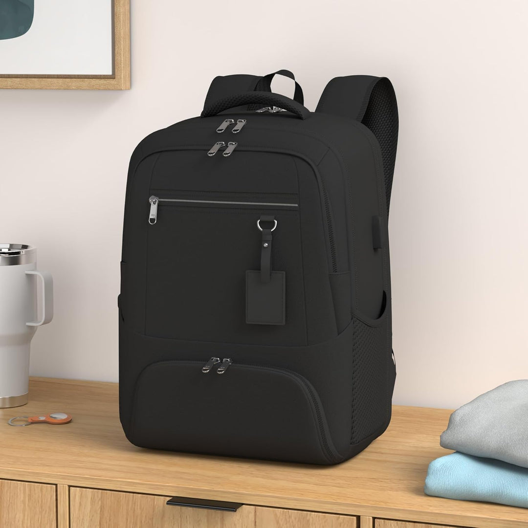 Black water-resistant laptop backpack for men & women, with insulated lunch compartment.