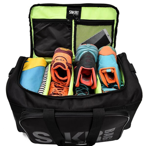 Unisex travel bag with comfortable shoulder strap. Water-resistant for sneakers, gear, and travel essentials.