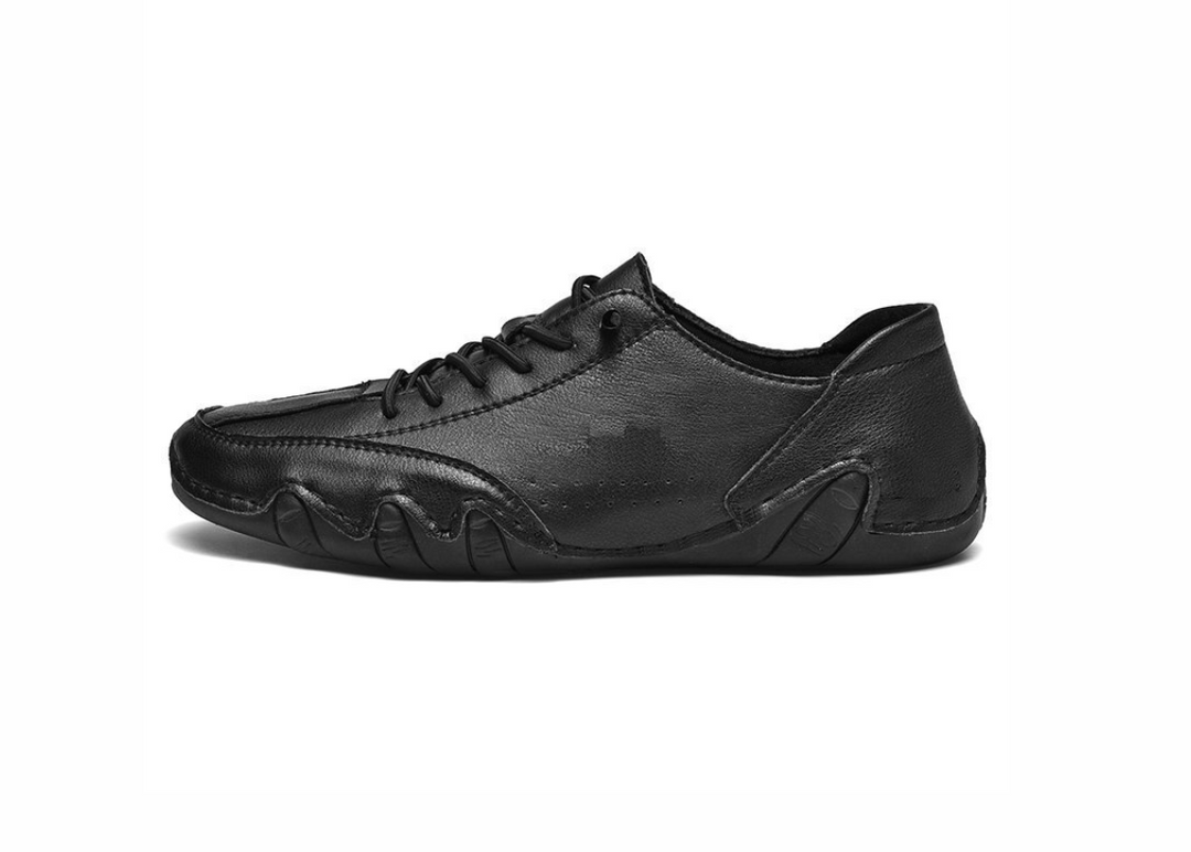 Close-up of non-slip, flexible rubber sole on unisex waterproof barefoot shoes for all-terrain grip.