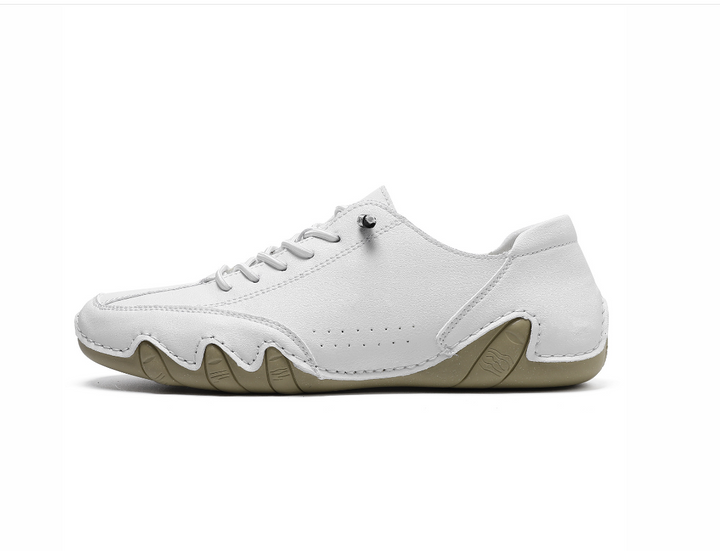 Person walking in unisex waterproof barefoot shoes, showing comfort, flexibility, & minimalist design.