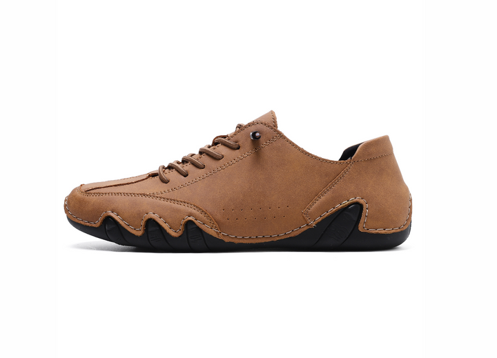 Texture of waterproof upper on unisex barefoot shoes, designed for all-weather protection & lightweight comfort.