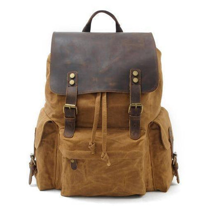 Detail shot of the durable hardware and stitching on a waterproof canvas leather backpack