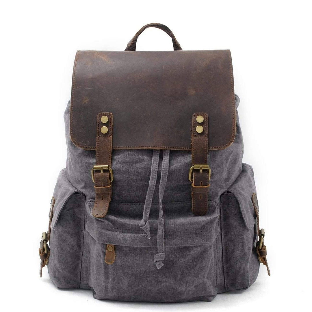 Large capacity unisex backpack made of waterproof canvas and leather, suitable for travel and hiking