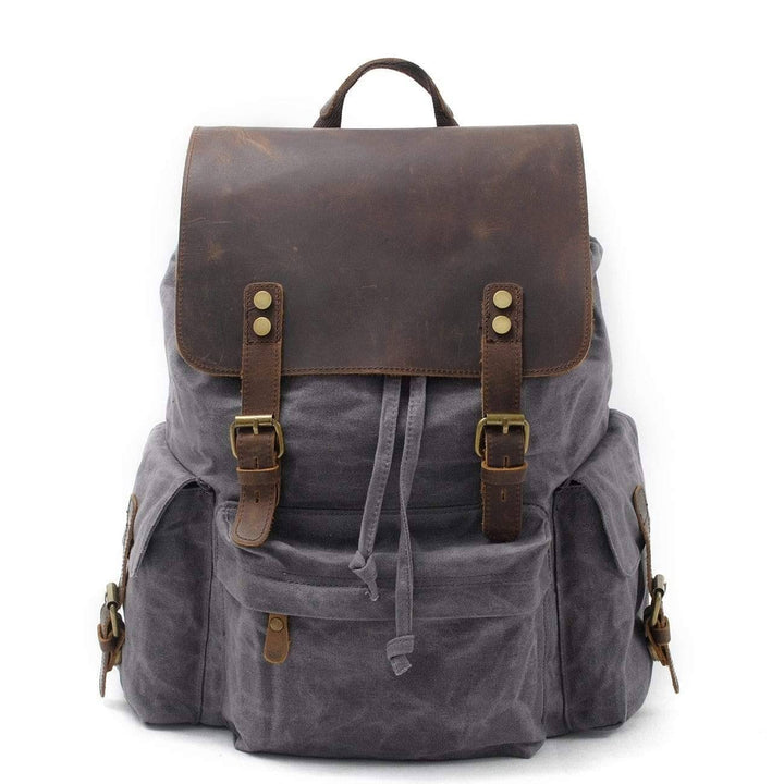 Large capacity unisex backpack made of waterproof canvas and leather, suitable for travel and hiking