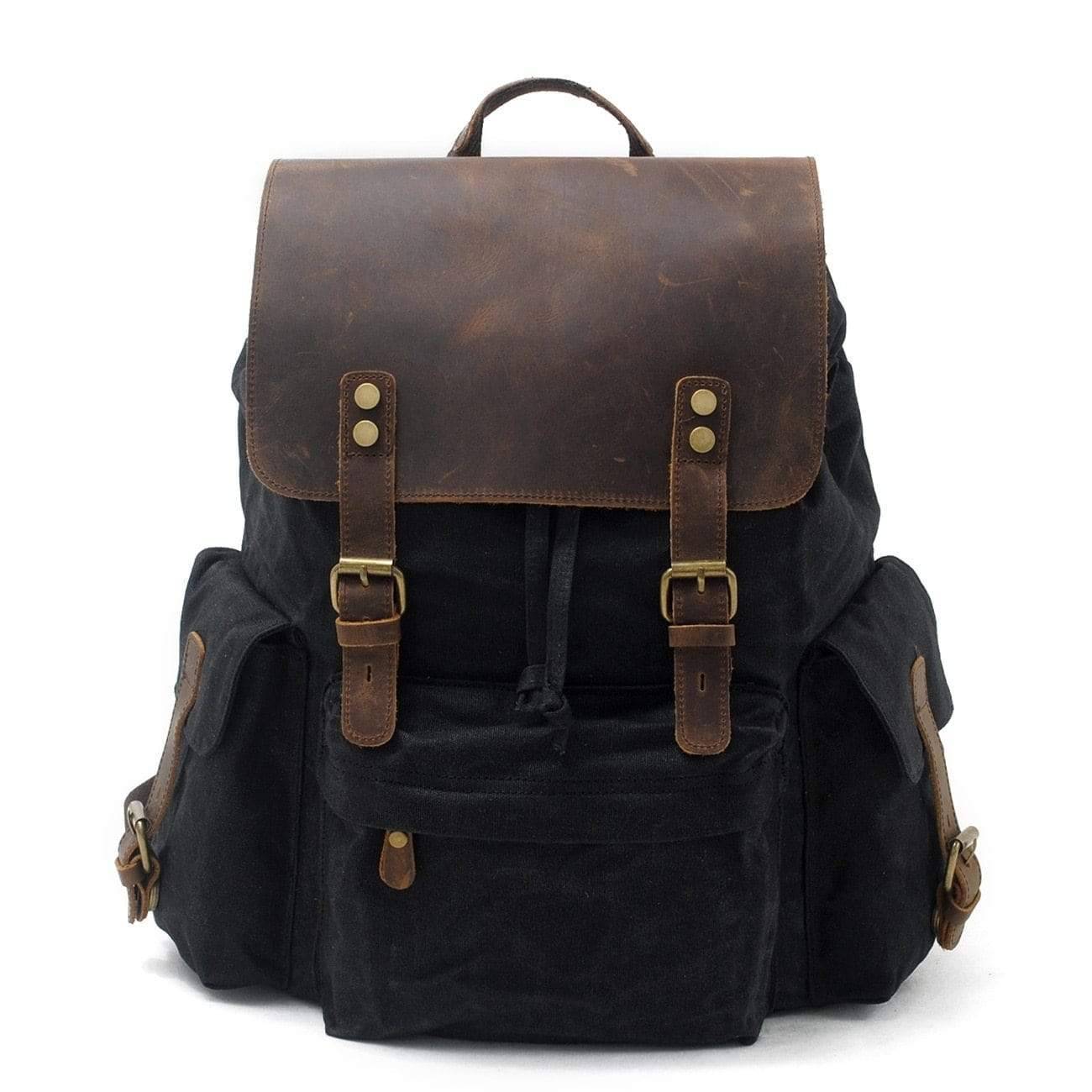 Close-up of waterproof canvas texture and leather straps on a durable travel backpack