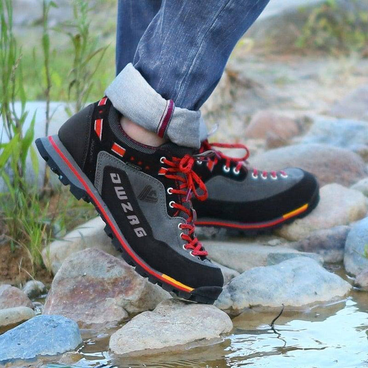 Waterproof anti-slip hiking shoes for men and women, shown in a forest setting