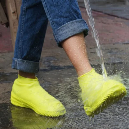 Unisex waterproof non-slip shoe covers, reusable for outdoor rain & mud protection. Durable footwear accessory.