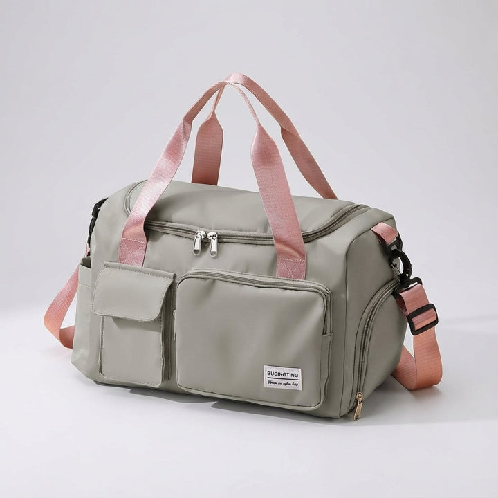 Waterproof nylon gym duffel bag with a shoe compartment. Ideal for sports & workouts. Unisex & durable weekend carry-on.