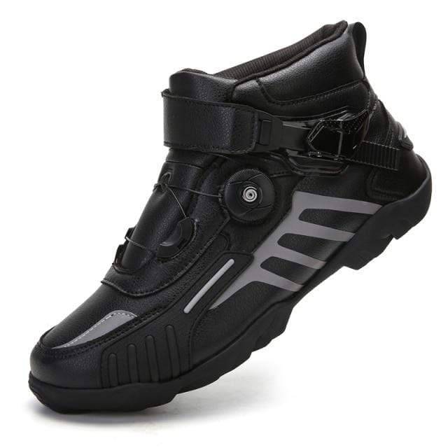 Detailed shot of waterproof motorcycle boots, showcasing sole and fastening, unisex design