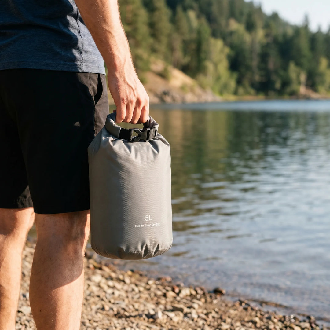 Unisex waterproof roll-top dry bag for outdoor adventures, protecting gear from water on camping or boating trips.