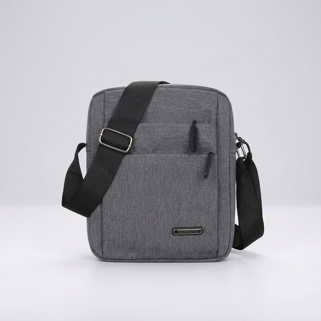 Close-up of the GuardSatchel waterproof sling bag, highlighting secure zippers & organized compartments for essentials.