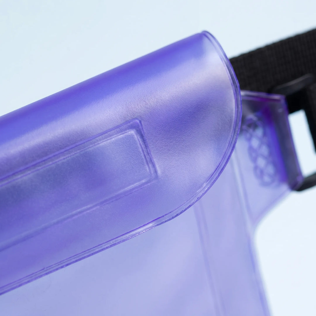 Stylish translucent dry bag fanny pack for beach trips. Keeps phone, keys, and cash safe and dry.