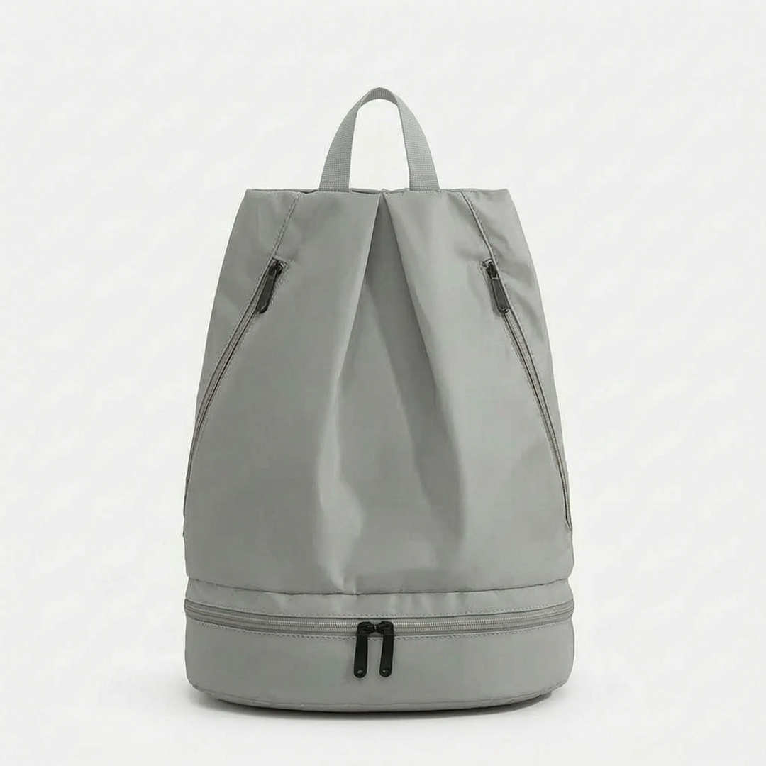 Spacious unisex waterproof travel backpack with multiple compartments & a convenient wet dry section for gear.