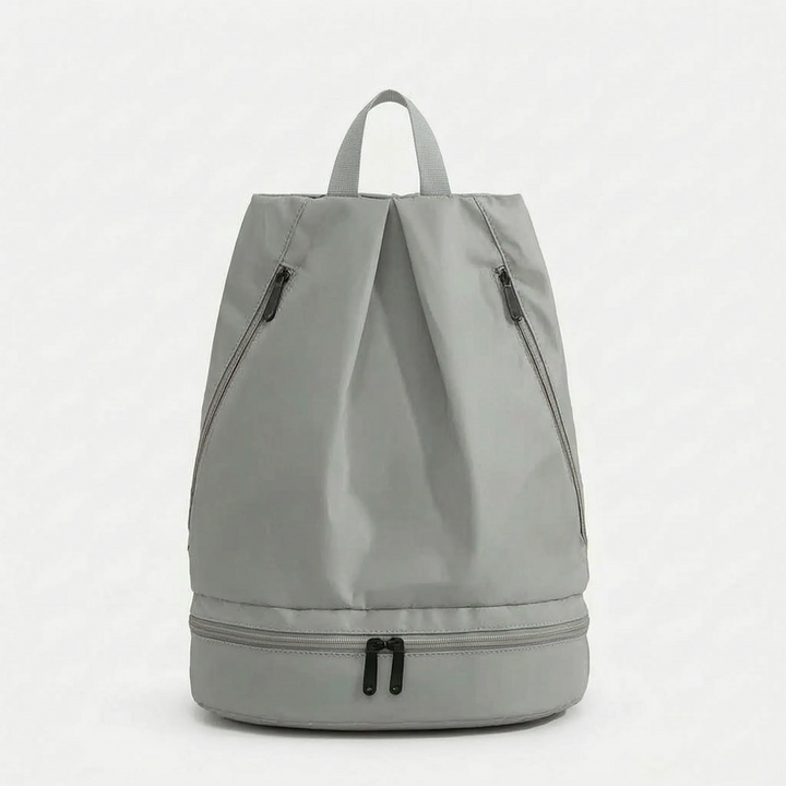 Spacious unisex waterproof travel backpack with multiple compartments & a convenient wet dry section for gear.
