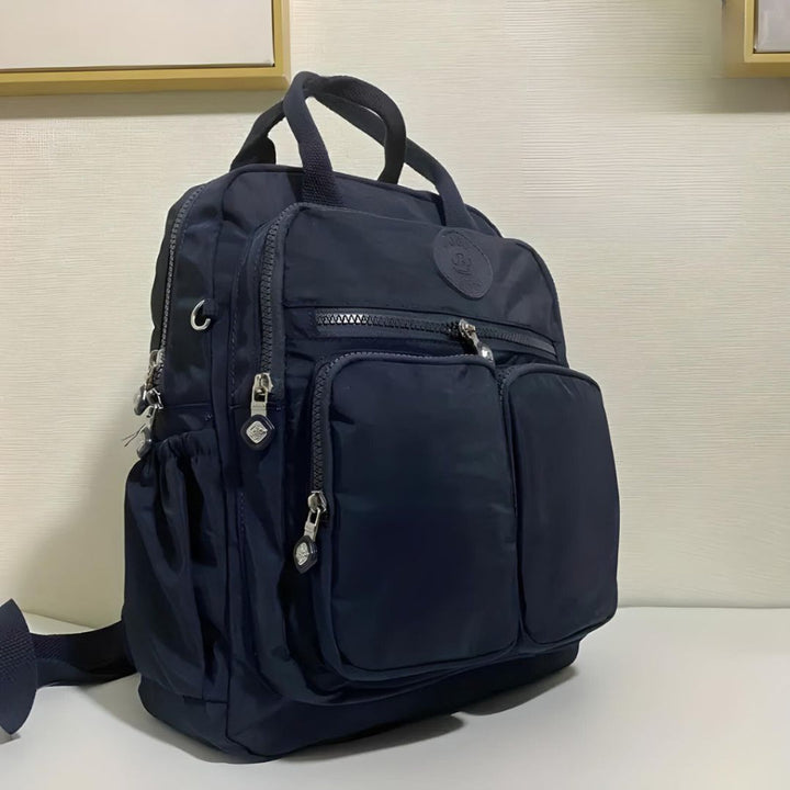 Waterproof urban backpack for men & women, featuring multiple storage pockets for daily essentials.