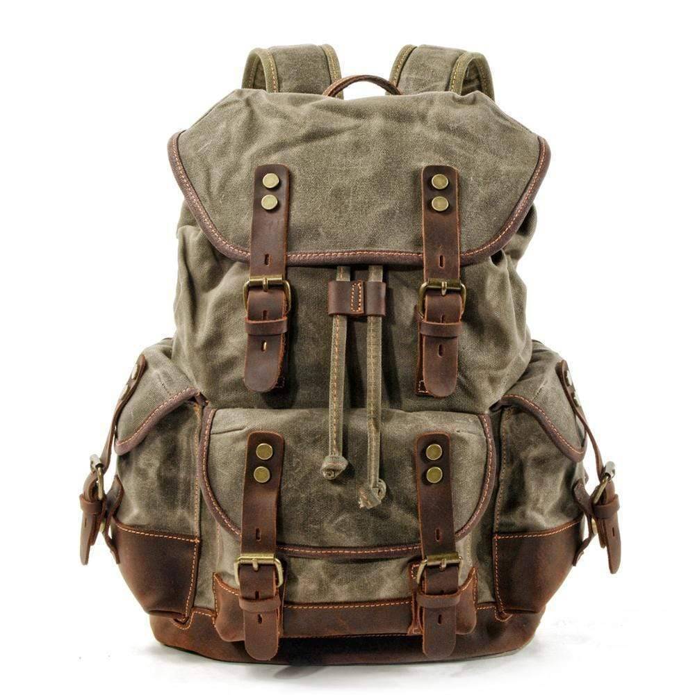 Unisex waterproof waxed canvas backpack, ideal for hiking & leisure, shown closed & ready for adventure