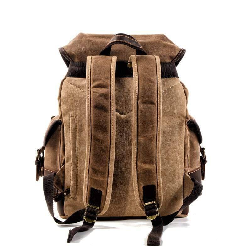 Durable waxed canvas backpack with waterproof finish, perfect for camping & outdoor travel gear