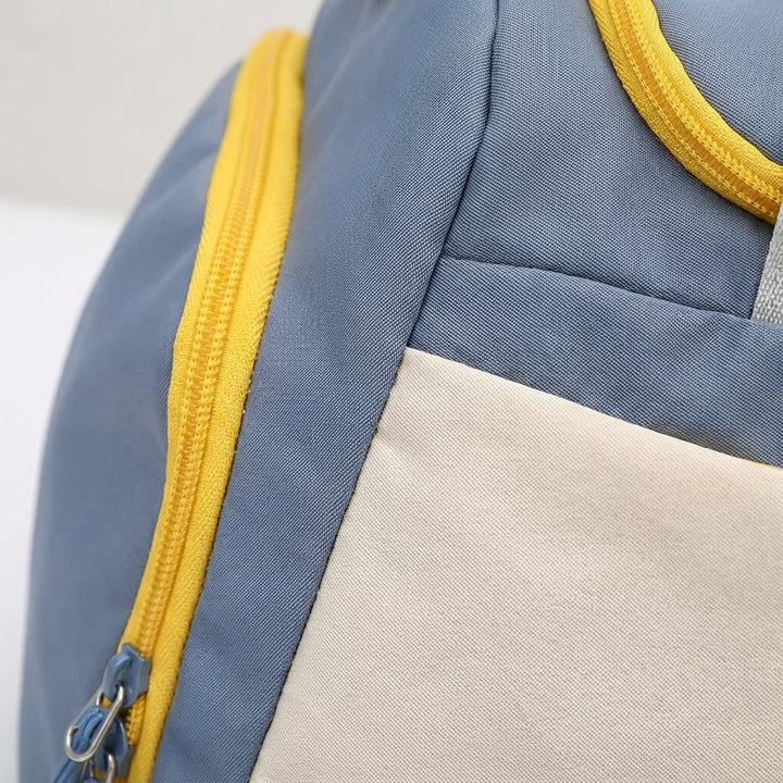 Stylish waterproof weekend travel bag for men & women, featuring a shoe compartment and luggage sleeve for easy travel.