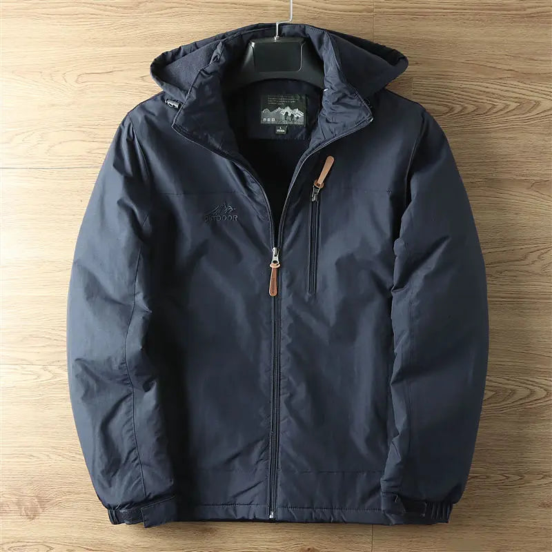 Durable unisex winter coat for outdoor adventures. Waterproof & insulated for cold weather travel.