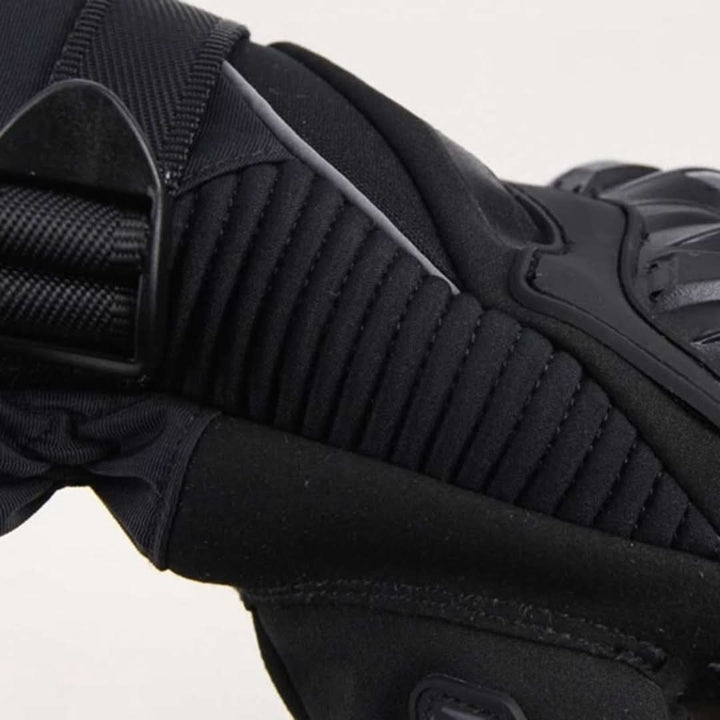 Protective waterproof motorcycle gloves. Ideal winter riding gear for cold weather, ensuring warmth & comfort.