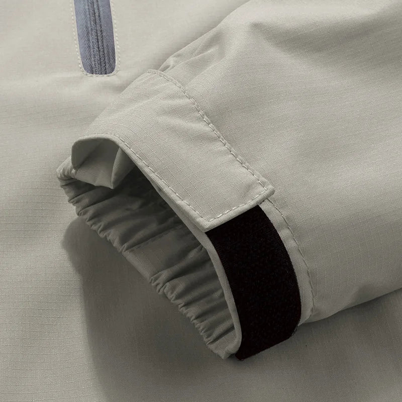 Stylish unisex hooded technical jacket, weatherproof, waterproof, windproof & breathable for comfort.