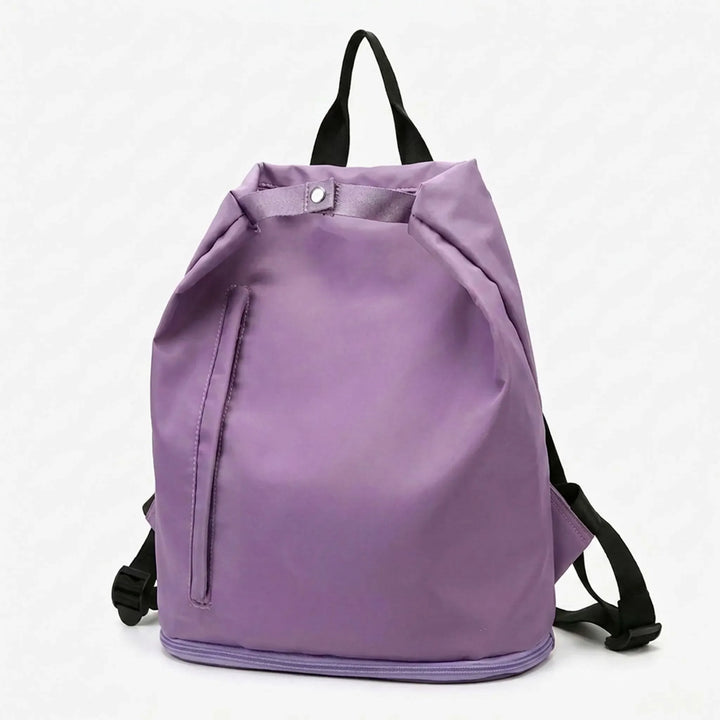 Spacious unisex wet dry gym bag & travel backpack with multiple compartments for organized storage.