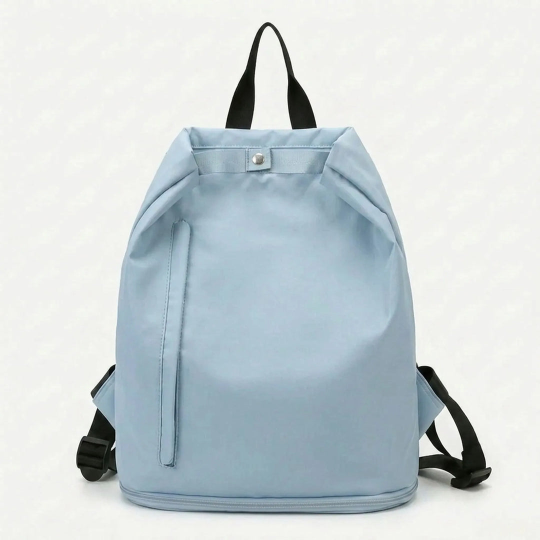 Side view of modern wet & dry sports backpack, featuring durable polyester & ample storage for travel.