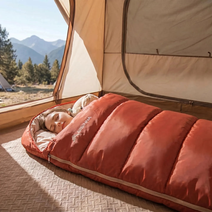 Unisex wide 3-season sleeping bag for adults, perfect for camping, hiking & outdoor comfort.