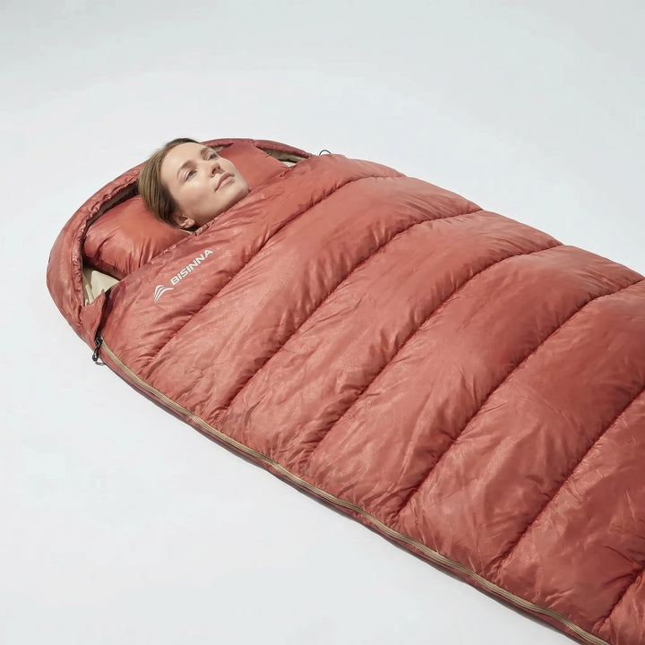 Spacious unisex wide 3-season sleeping bag interior, ensuring comfort for adult camping & backpacking.