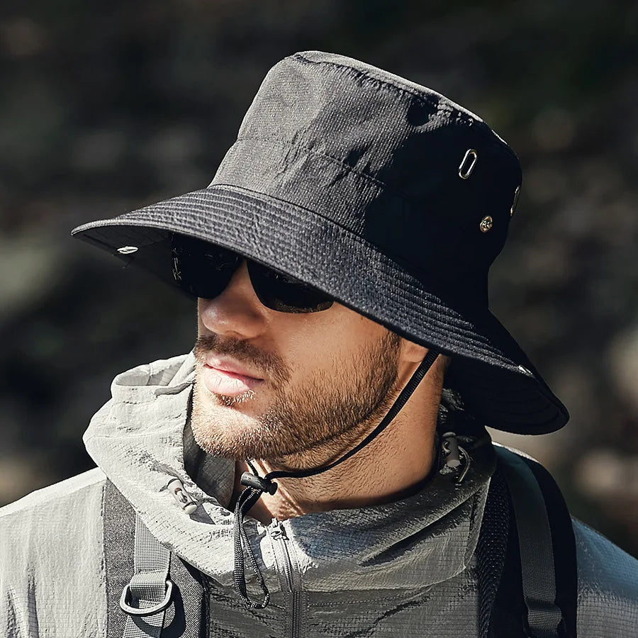 Unisex wide brim sun hat for outdoor comfort, offering essential UV protection.