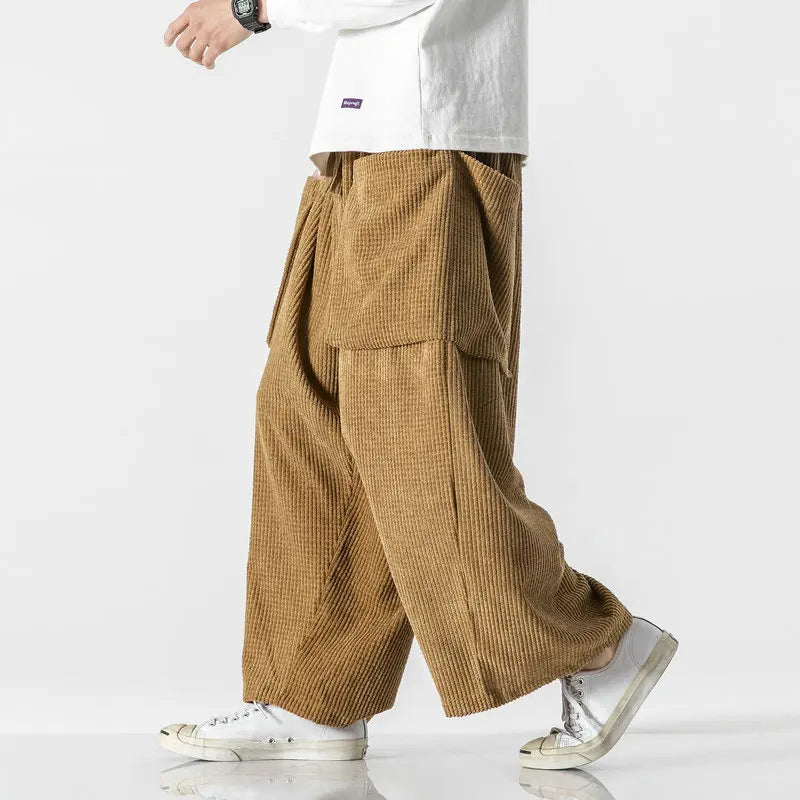 Khaki unisex wide leg sweatpants with relaxed fit & adjustable waist. Comfortable lounge wear for all genders.