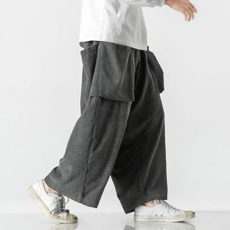 Black unisex wide leg relaxed fit sweatpants, ideal for streetwear or casual comfort. Versatile and stylish.