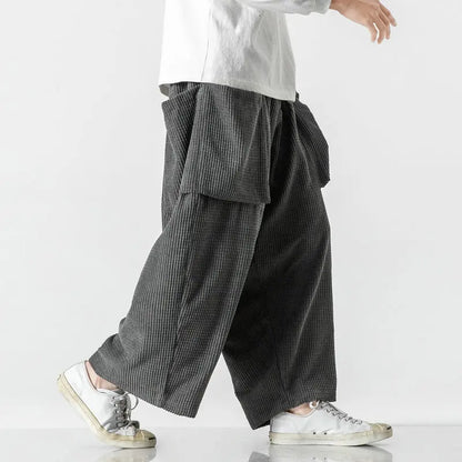 Black unisex wide leg relaxed fit sweatpants, ideal for streetwear or casual comfort. Versatile and stylish.