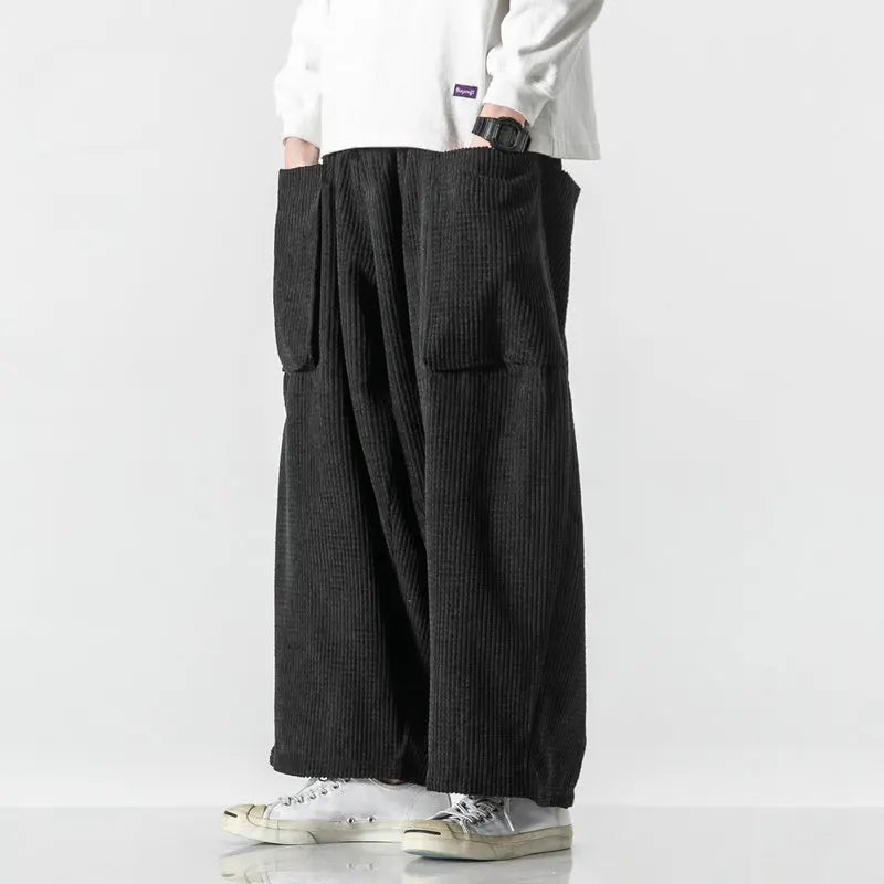 Dark blue unisex wide leg sweatpants; relaxed fit for ultimate comfort. Adjustable waist, great for lounging.