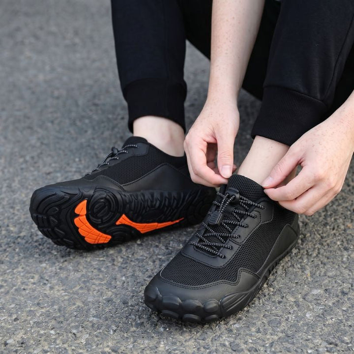 Breathable unisex hiking shoes featuring a wide toe box & zero drop for natural trail walking.