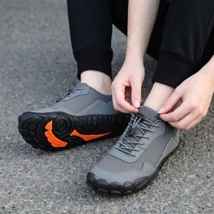 Zero drop unisex hiking shoes: wide toe box and orthopedic support for natural trail comfort.