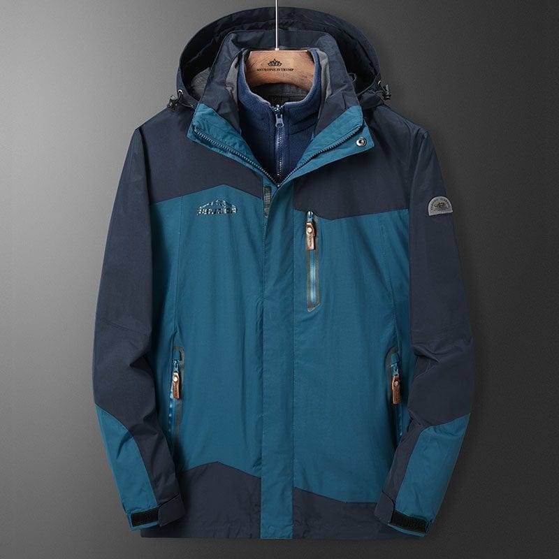 Durable unisex mountaineering suit, 3-in-1 winter jacket, red, ideal for cold weather adventures, close-up of material.
