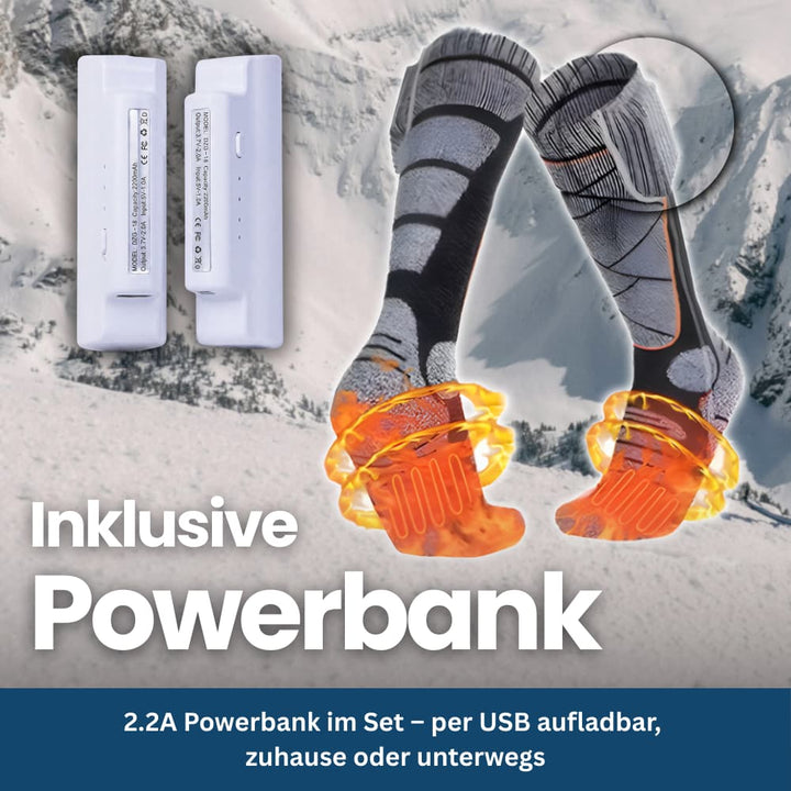 Foot warmers: unisex heated socks and power bank, essential outdoor gear for extreme cold weather.