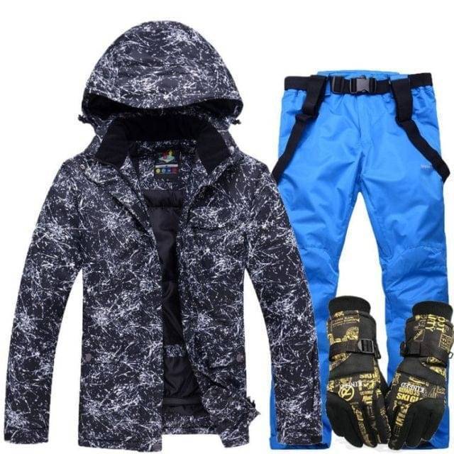 Action shot: person skiing wearing a unisex hooded waterproof ski suit, warm outdoor gear