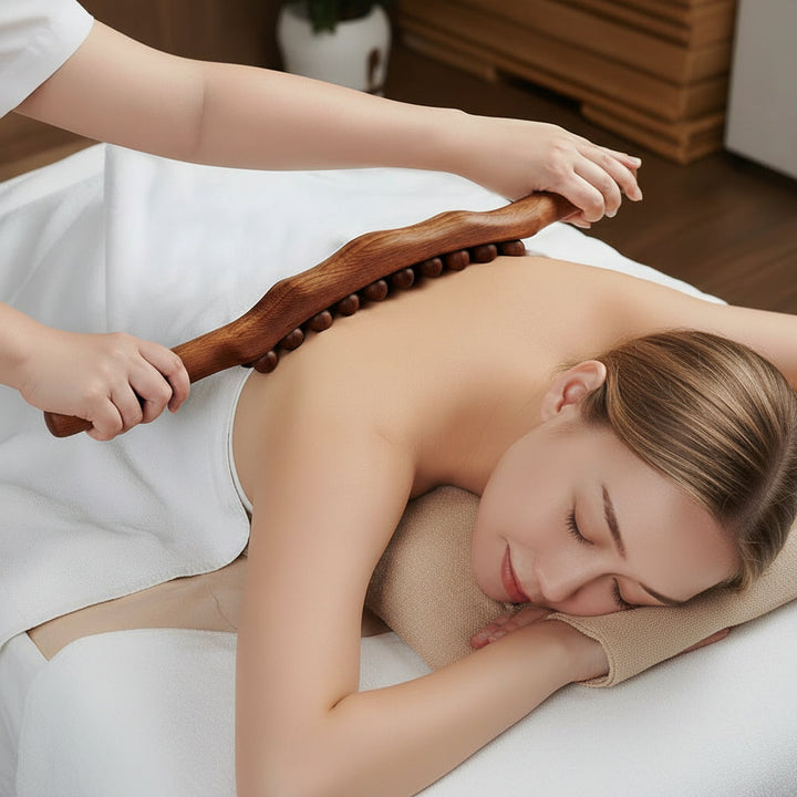 Ergonomic wooden Gua Sha tool for deep tissue body massage, aiding muscle recovery & wellness.