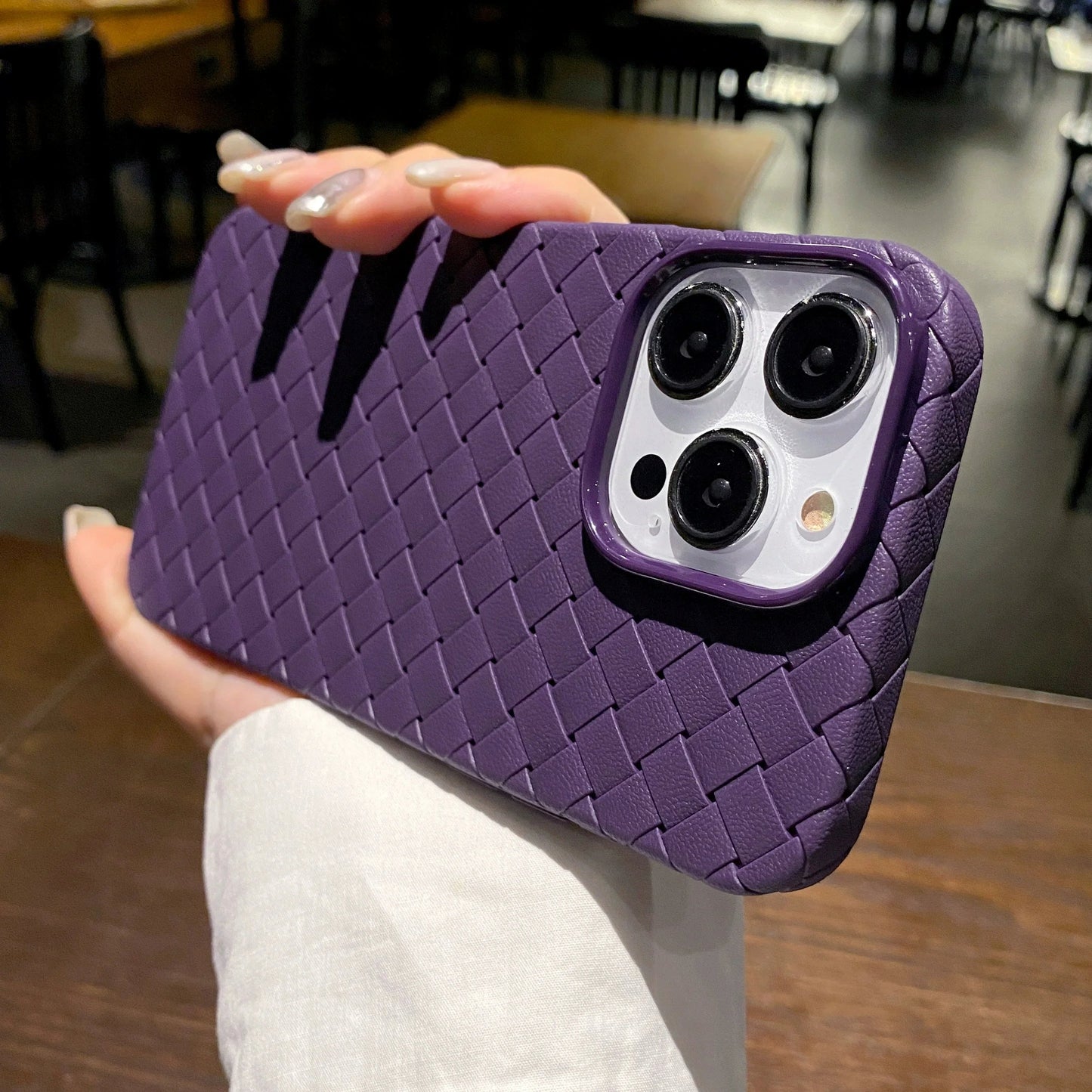 Unisex woven texture iPhone case. Slim, shockproof TPU supports wireless charging & provides anti-slip protection.