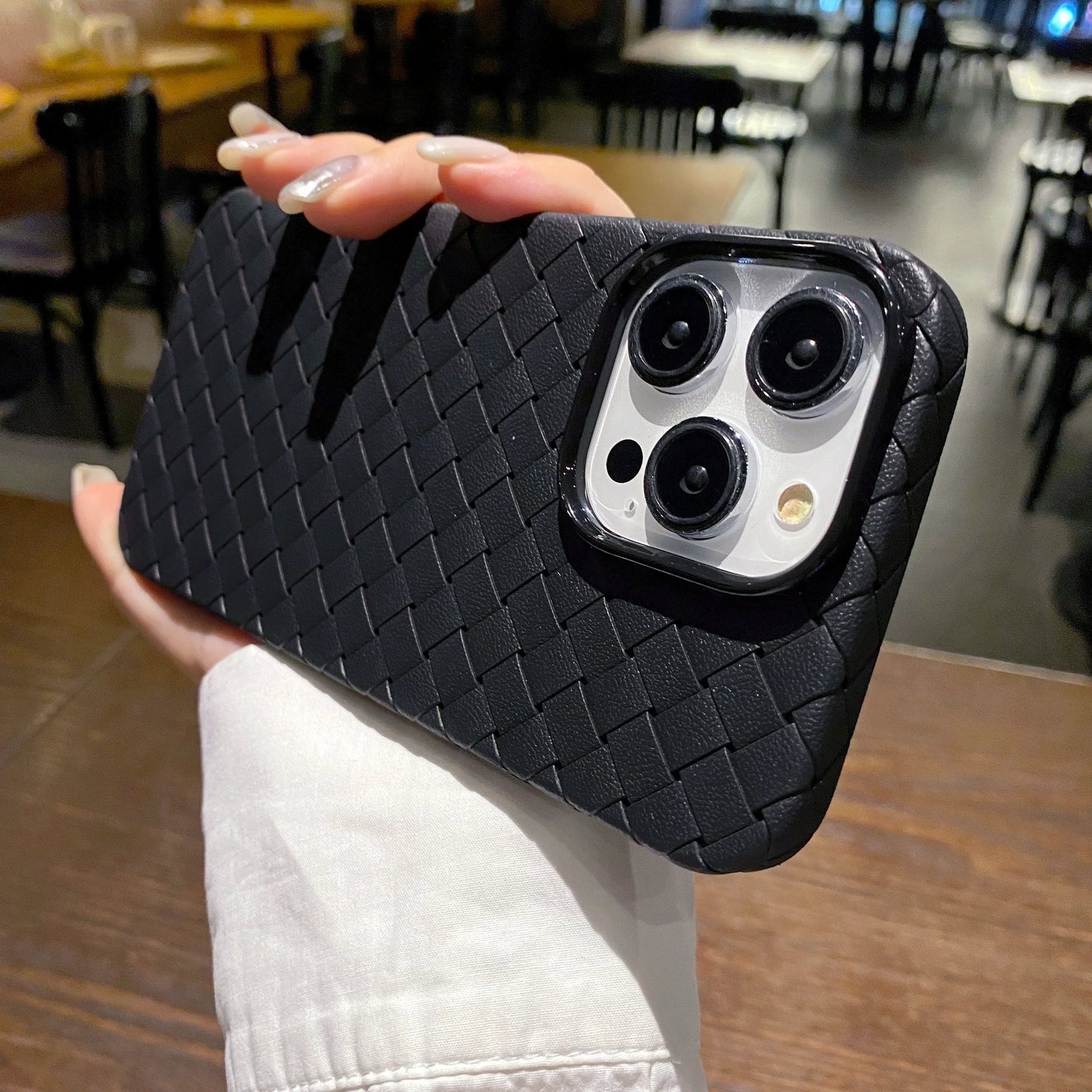 Durable woven texture iPhone case offering shockproof protection. Slim, anti-slip TPU material for everyday style.