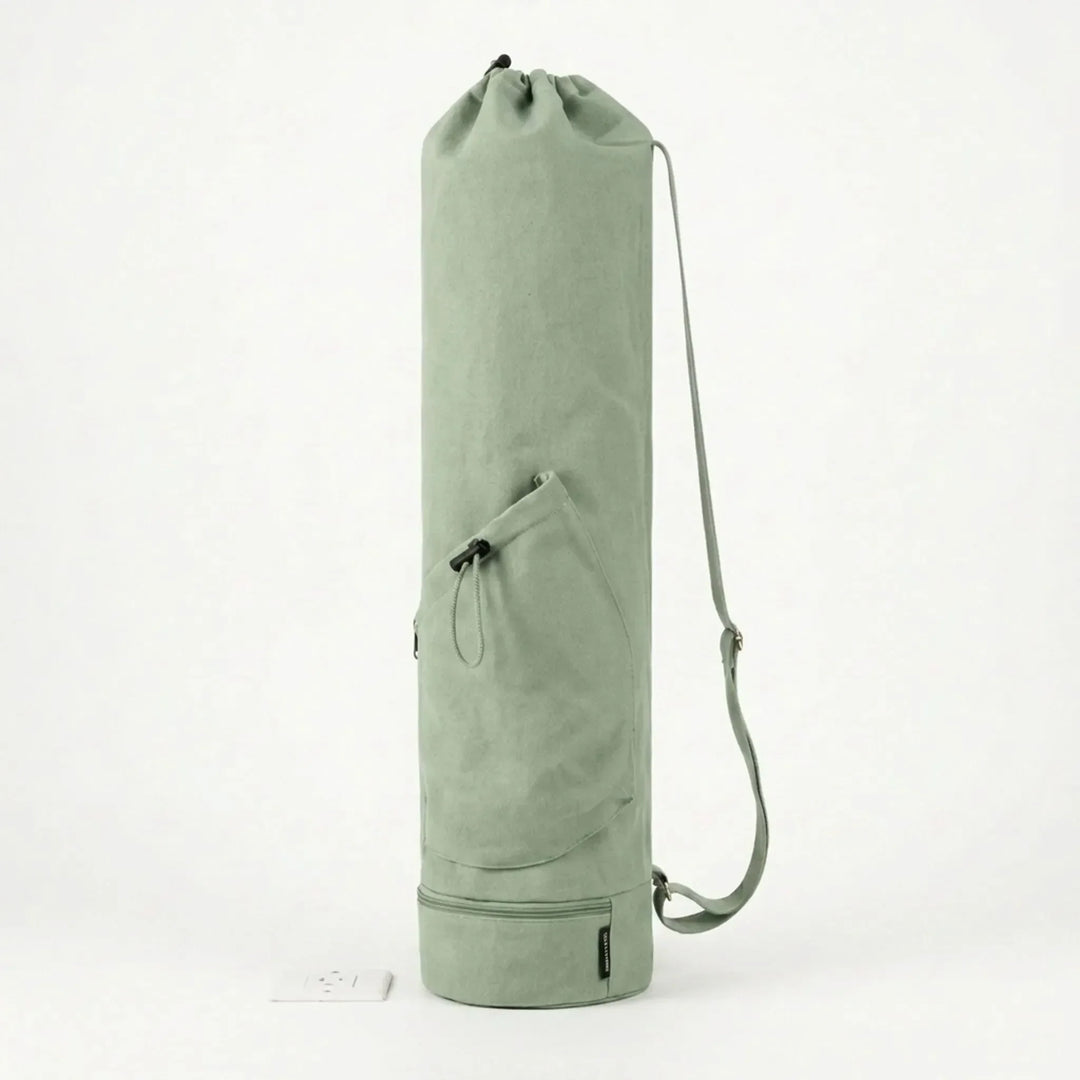 Stylish drawstring yoga mat bag, a practical activewear accessory for studio, gym, or outdoor yoga. Unisex design.
