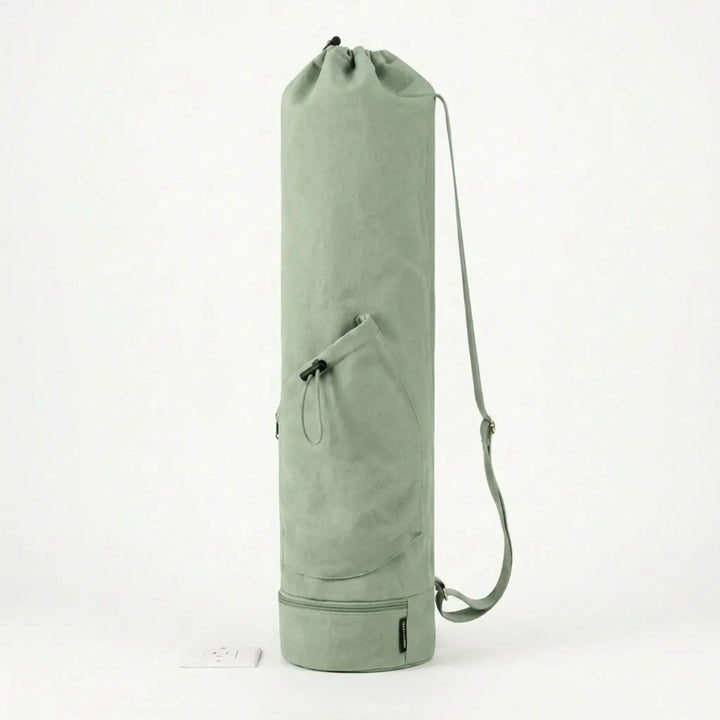 Stylish drawstring yoga mat bag, a practical activewear accessory for studio, gym, or outdoor yoga. Unisex design.