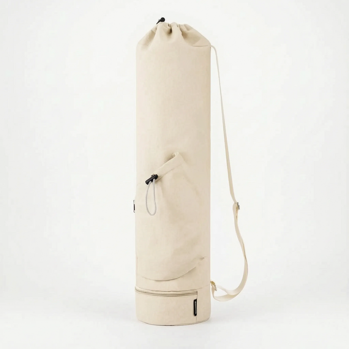 Essential workout accessory: a unisex yoga mat bag with adjustable strap, perfect for carrying mats to class.