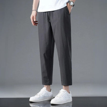 Unisex Zephy pants for daily wear, designed with a comfortable elastic waistband and flexible fit for all activities.