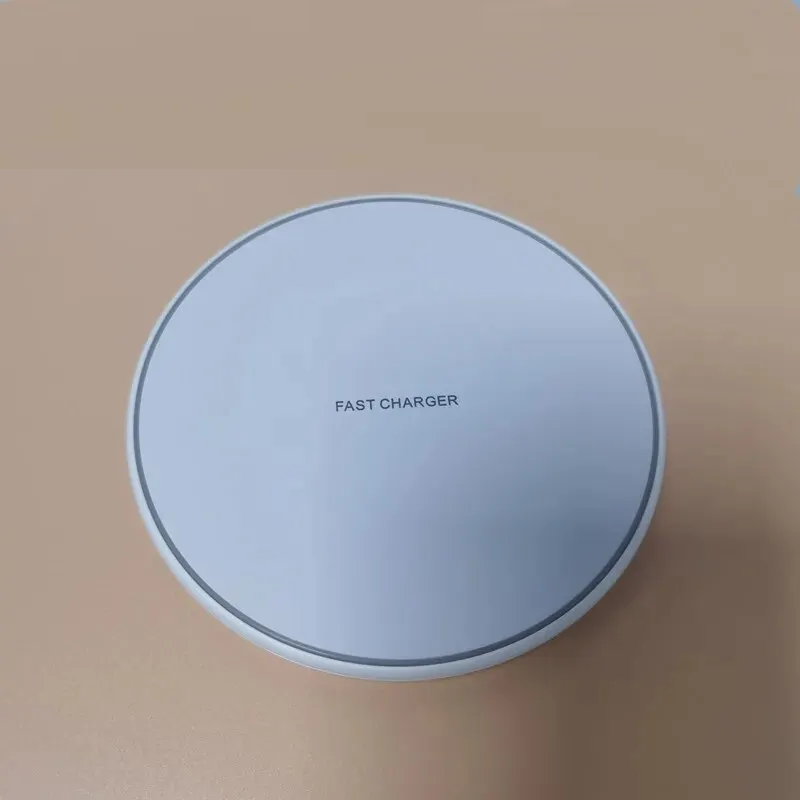 Desk-friendly 30W fast wireless charger pad for iPhone & Android smartphones. Seamless power.